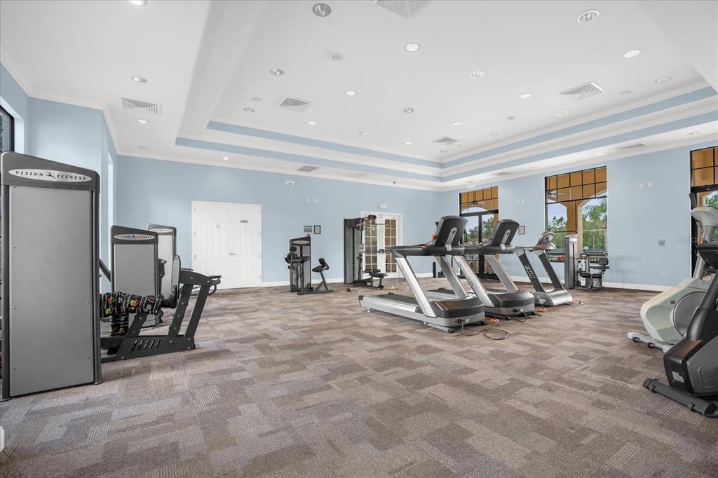 1374 Pacific Road Poinciana, FL 34759 - Photo 34 of 42 a view of a room with gym equipment