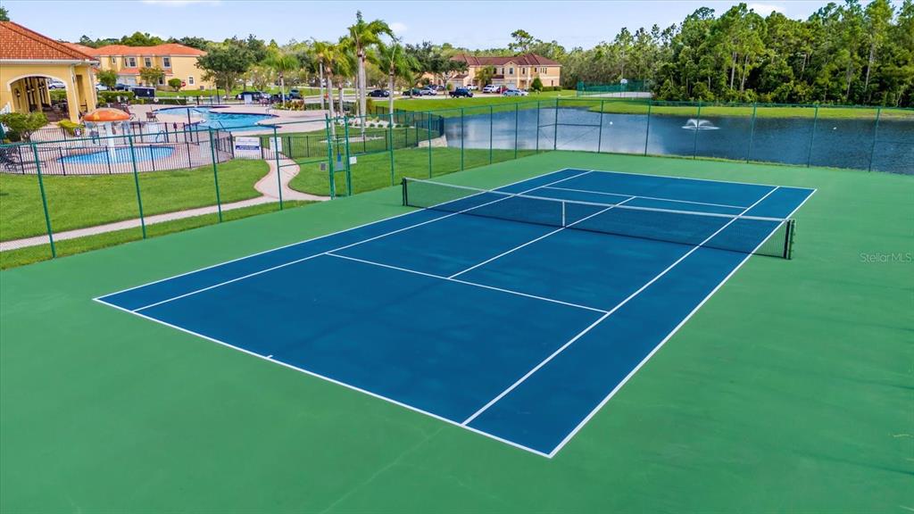 1374 Pacific Road Poinciana, FL 34759 - Photo 40 of 42 a view of a tennis court