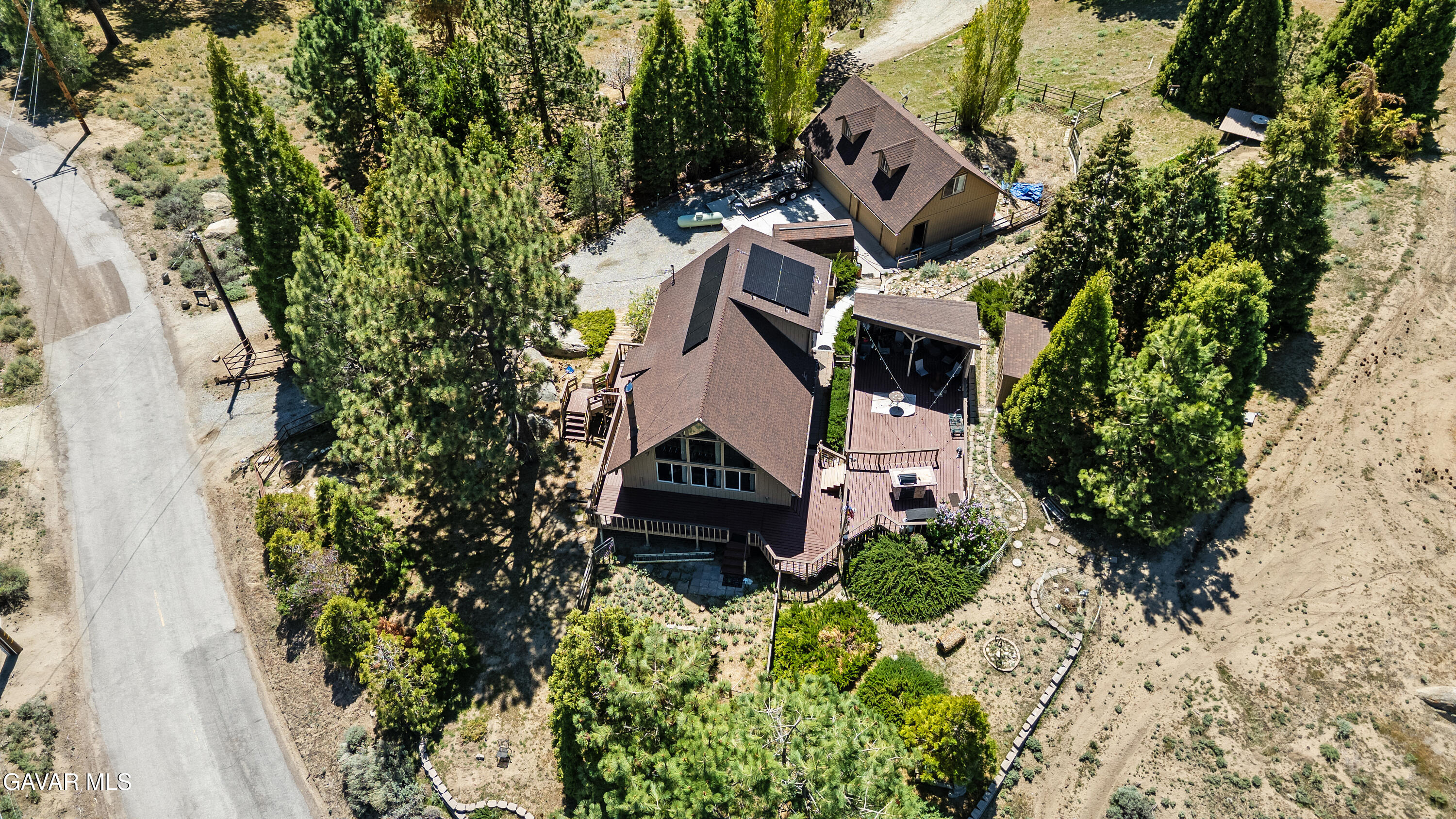 25631 High Rock Court Tehachapi, CA 93561 - Photo 26 of 31 an aerial view of a house with a yard and garden