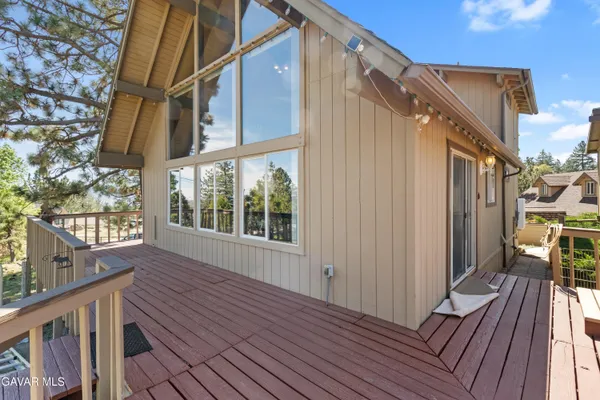 a view of a house with a deck