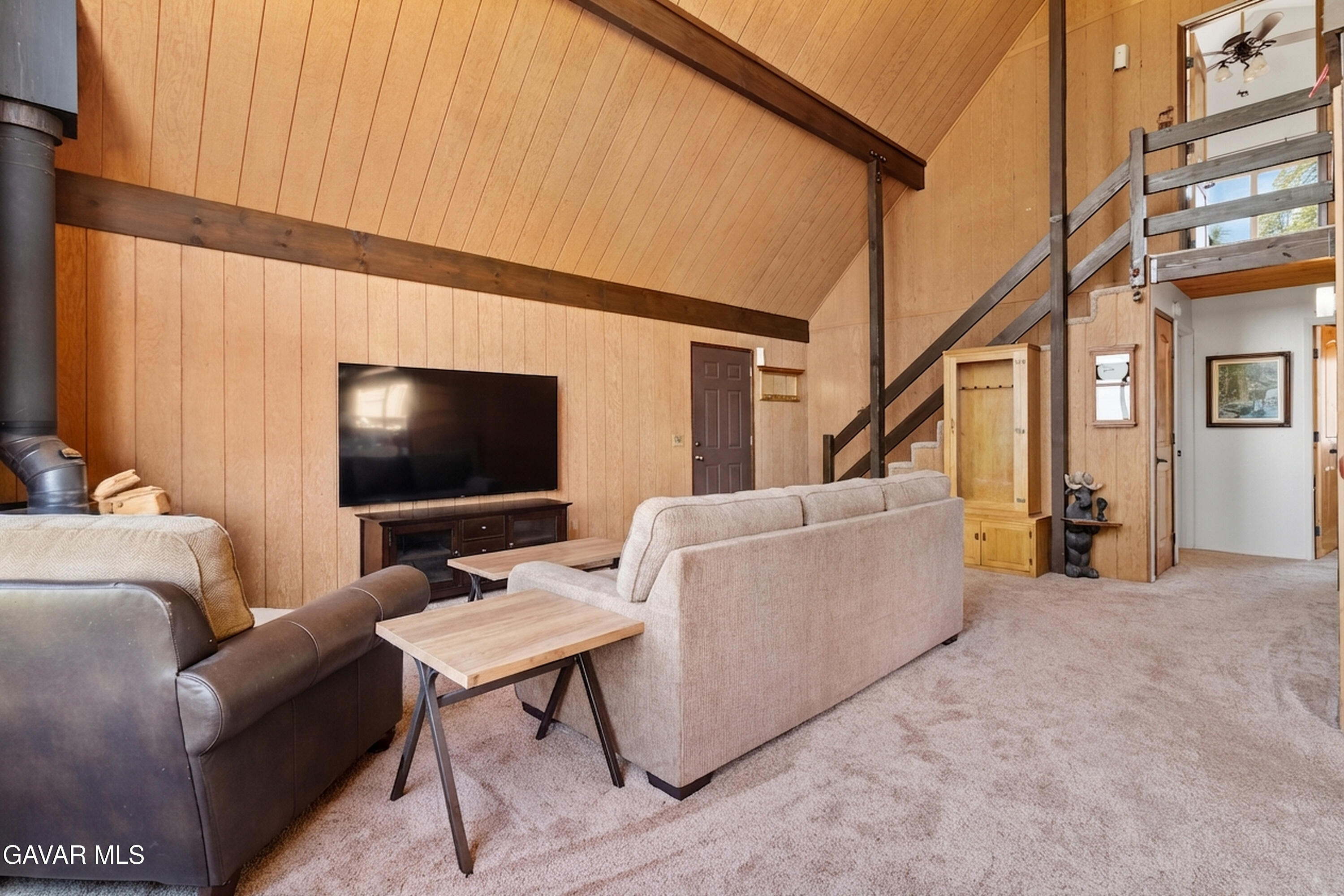 25631 High Rock Court Tehachapi, CA 93561 - Photo 5 of 31 a living room with furniture and a flat screen tv