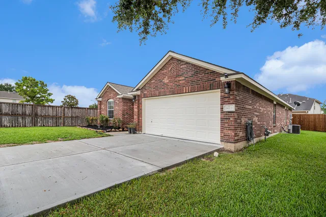 a view of a backyard of the house