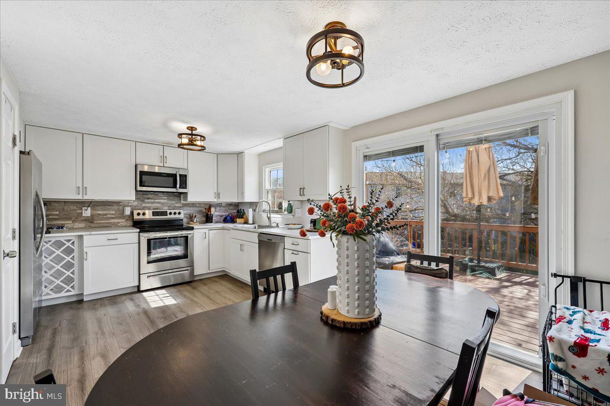 1476 Dockside Court Frederick, MD 21701 - Photo 14 of 34 a kitchen with a sink appliances and cabinets
