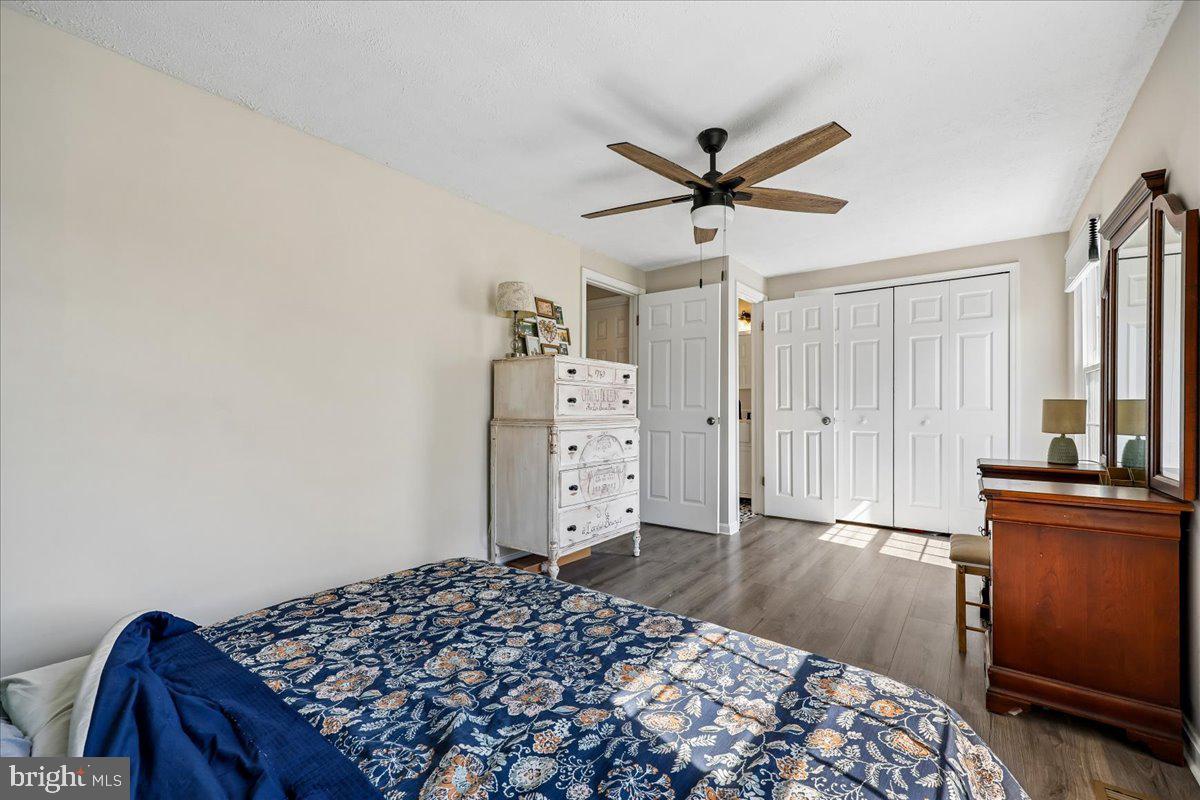 1476 Dockside Court Frederick, MD 21701 - Photo 17 of 34 a bedroom with a bed and a dresser