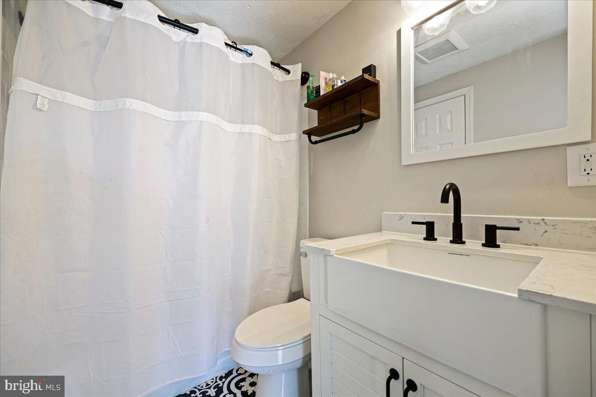 1476 Dockside Court Frederick, MD 21701 - Photo 19 of 34 a bathroom with a sink and a toilet