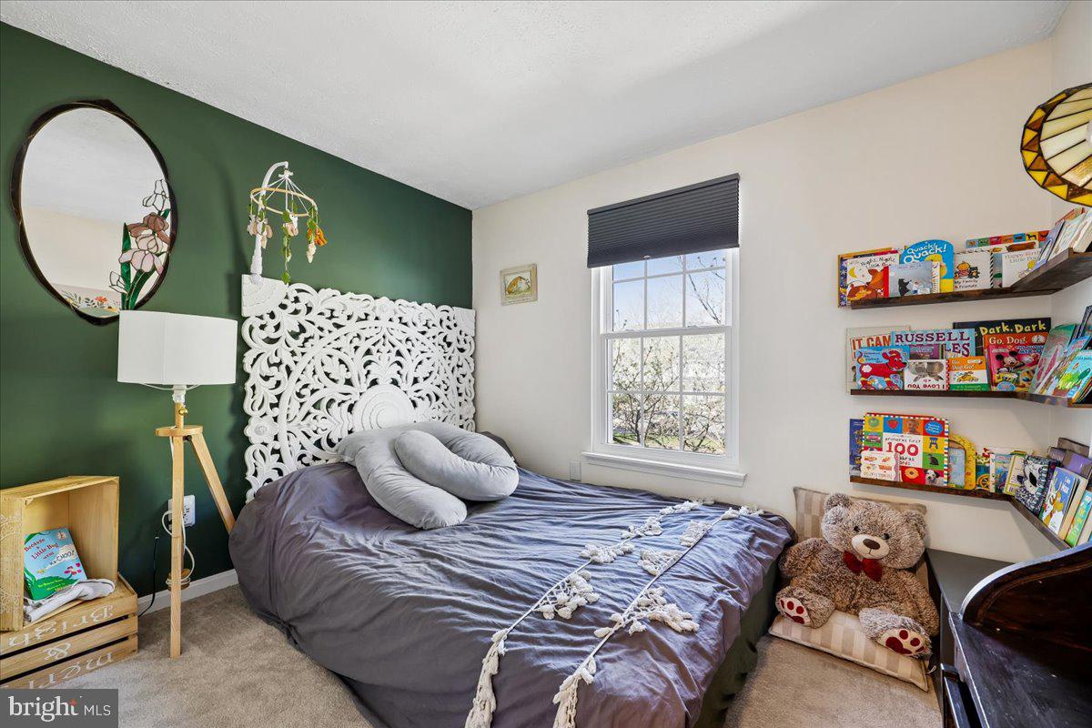 1476 Dockside Court Frederick, MD 21701 - Photo 20 of 34 a bedroom with a bed and a window