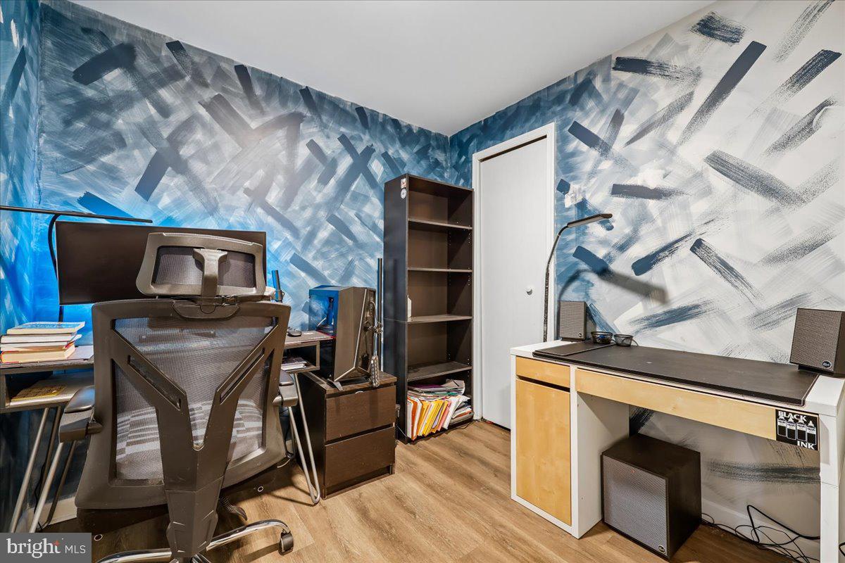 1476 Dockside Court Frederick, MD 21701 - Photo 26 of 34 a view of a livingroom with furniture and a flat screen tv