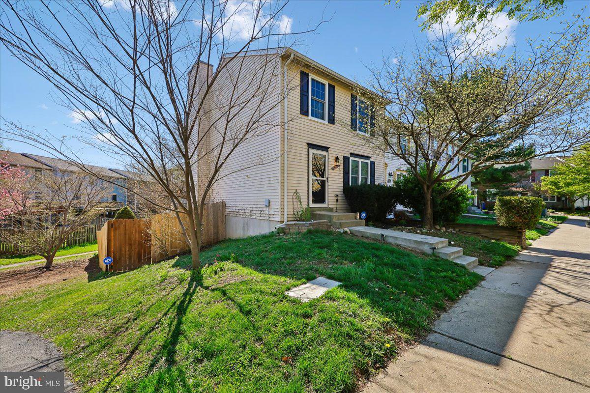 1476 Dockside Court Frederick, MD 21701 - Photo 28 of 34 a view of a white house with a yard