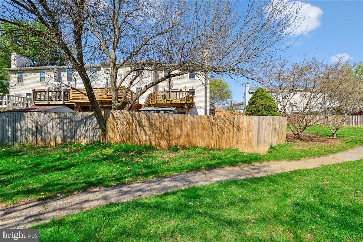 1476 Dockside Court Frederick, MD 21701 - Photo 32 of 34 a backyard of a house with lots of green space