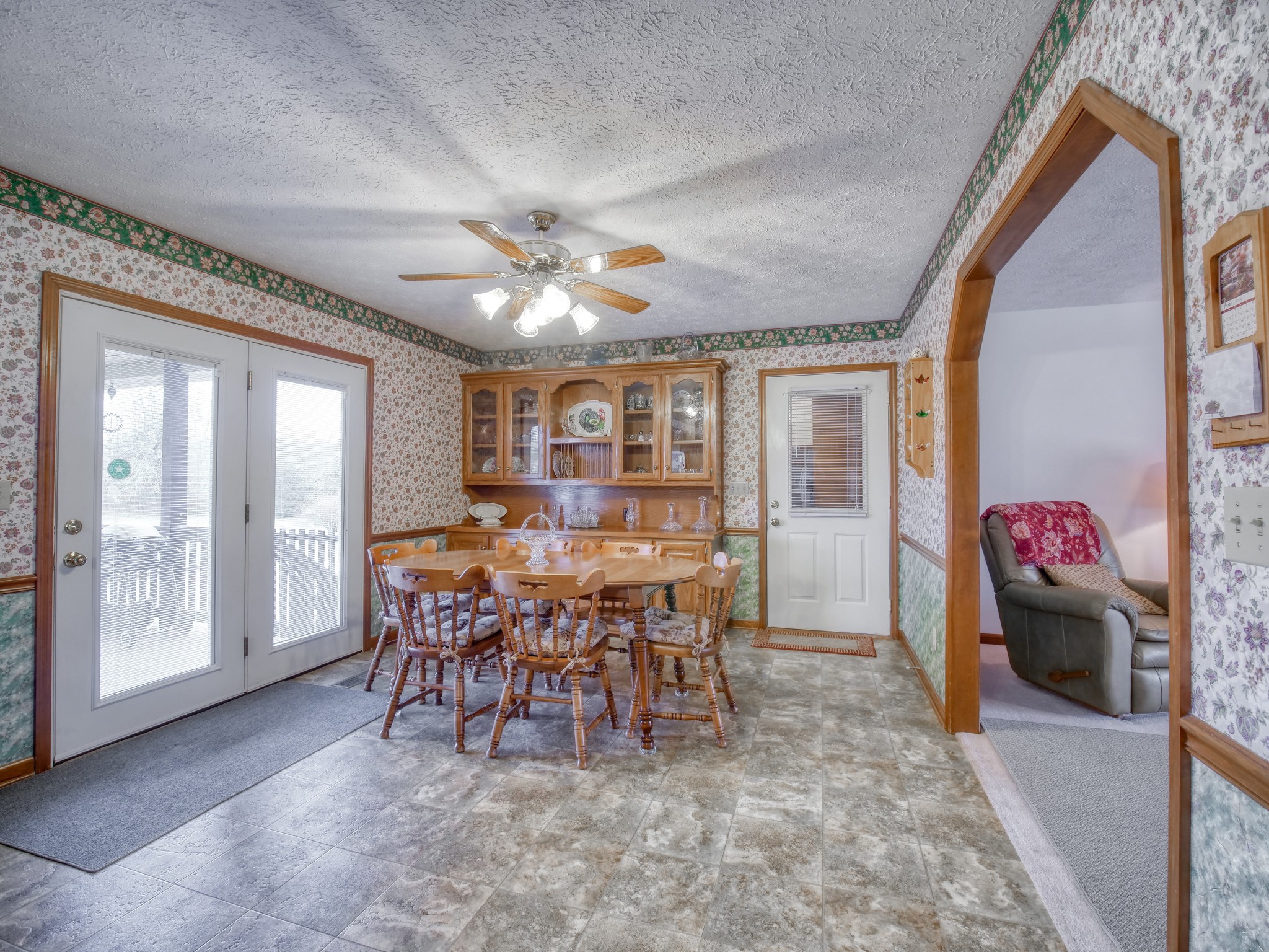 5149 Beech Log Road Lebanon, TN 37090 - Photo 19 of 44 a view of a dining room with furniture and chandelier