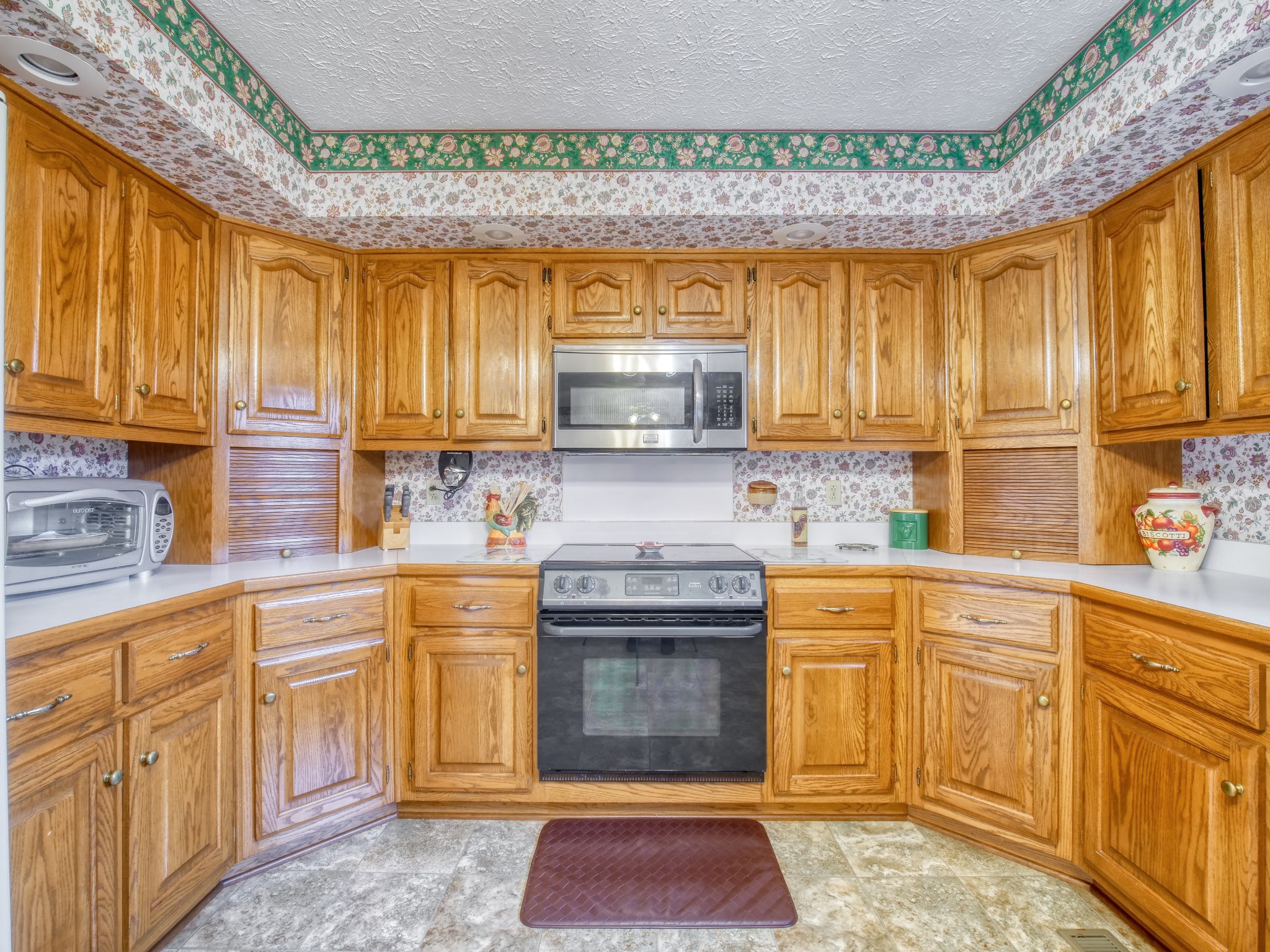 5149 Beech Log Road Lebanon, TN 37090 - Photo 21 of 44 a kitchen with cabinets appliances and a counter top