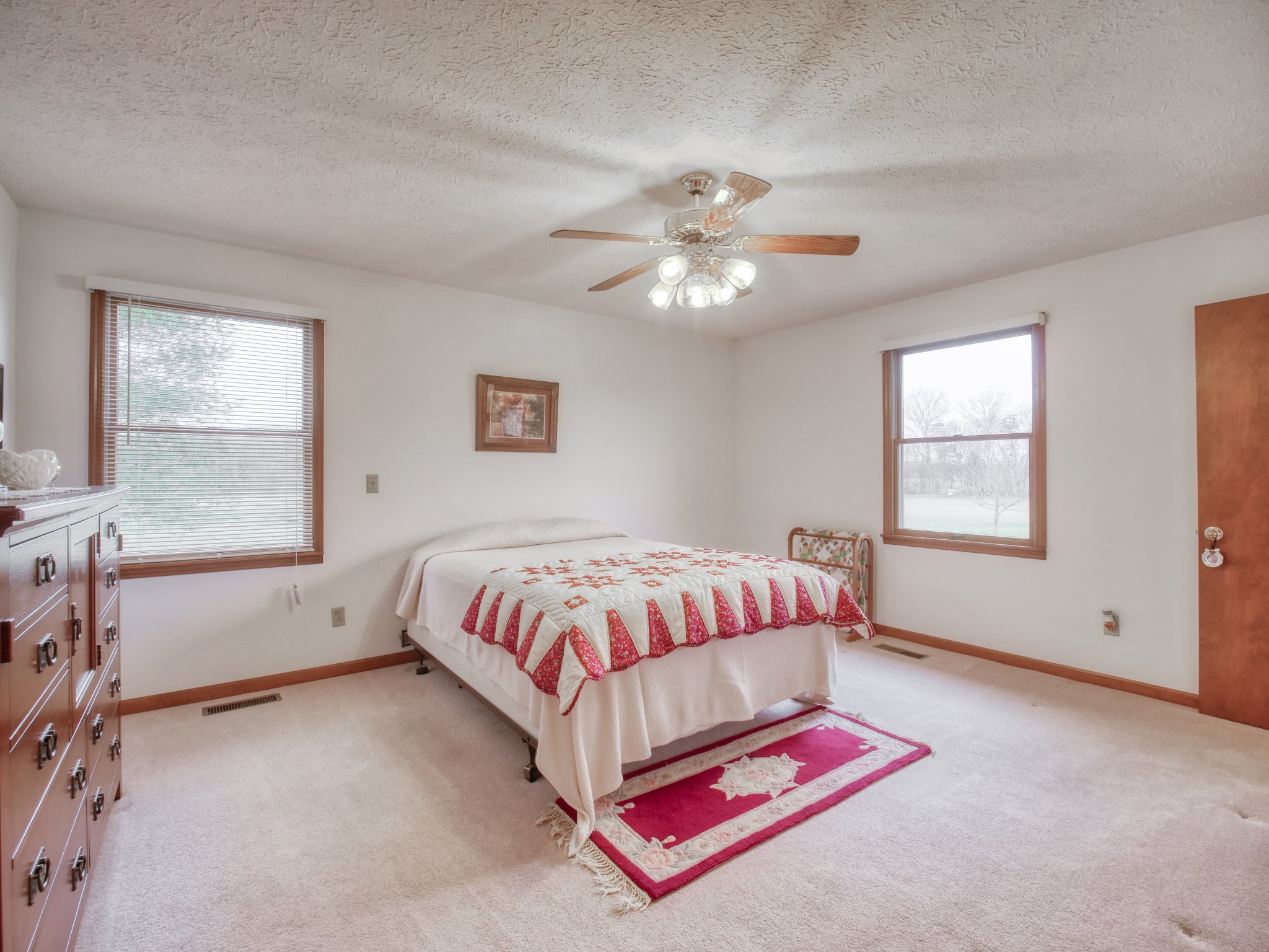5149 Beech Log Road Lebanon, TN 37090 - Photo 28 of 44 a spacious bedroom with a bed and a window