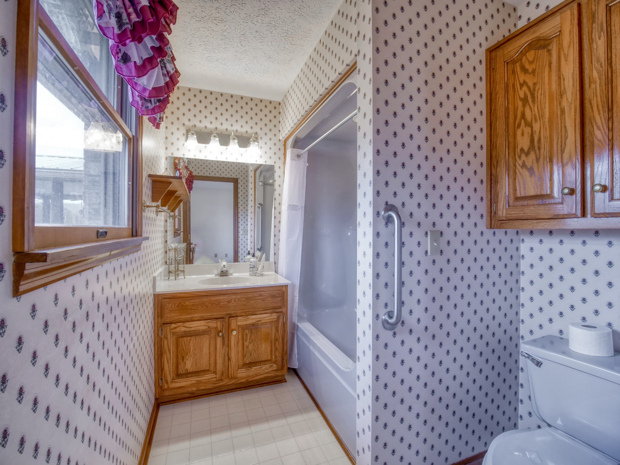 5149 Beech Log Road Lebanon, TN 37090 - Photo 29 of 44 a bathroom with a sink a toilet and shower