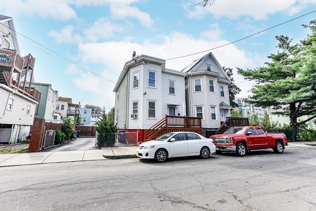 291 Carter Street Chelsea, MA 02150 - Photo 2 of 40 a view of a cars park in front of a building