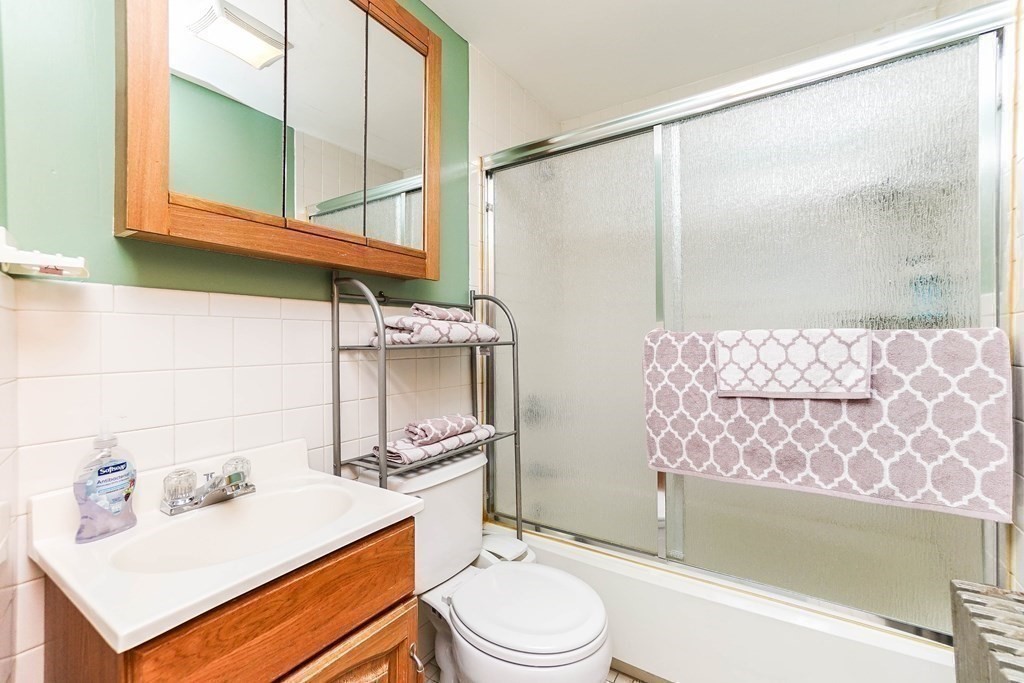 291 Carter Street Chelsea, MA 02150 - Photo 28 of 40 a bathroom with a sink toilet and shower