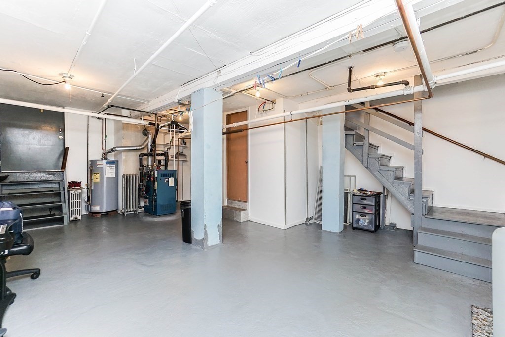 291 Carter Street Chelsea, MA 02150 - Photo 31 of 40 a view of an empty room with stairs