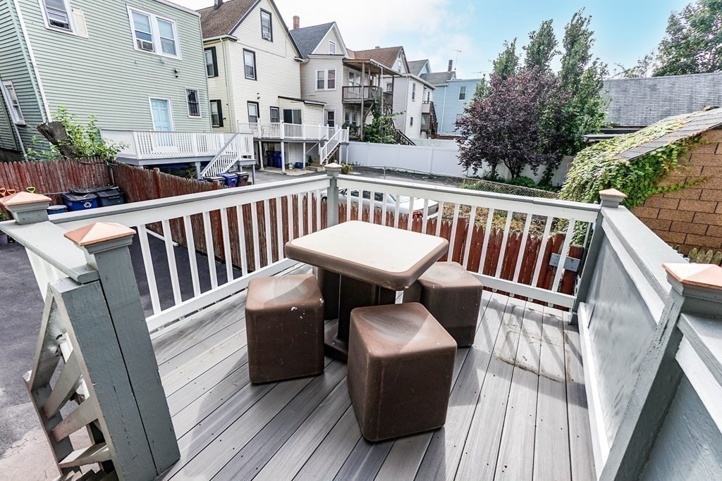 291 Carter Street Chelsea, MA 02150 - Photo 6 of 40 a view of a chair in the balcony