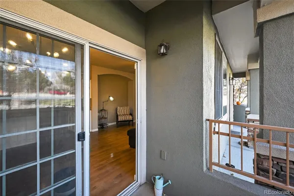 a room with a large window and front door