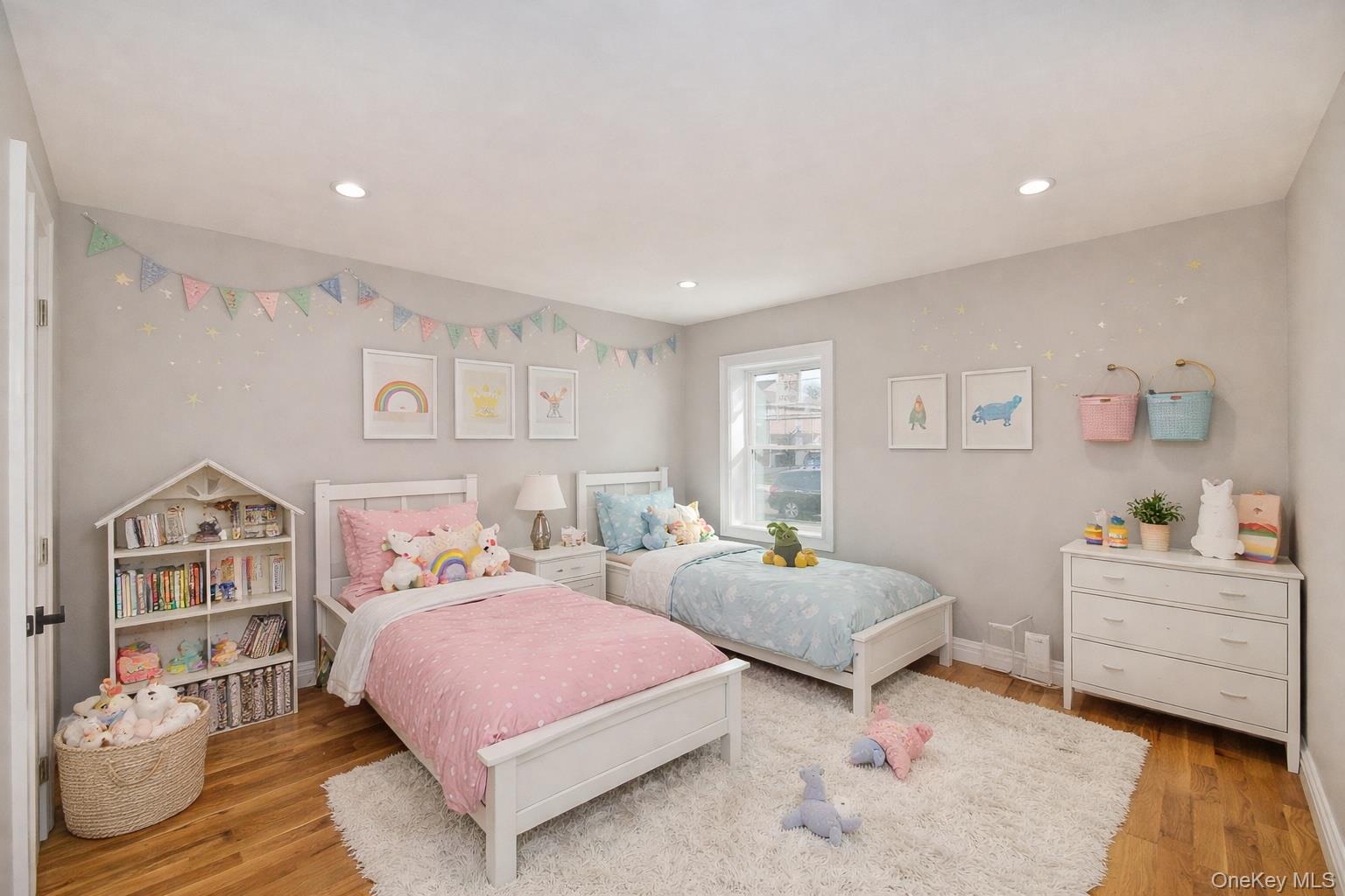 1903 George Court Merrick, NY 11566 - Photo 24 of 39 a bedroom with two beds and a couch