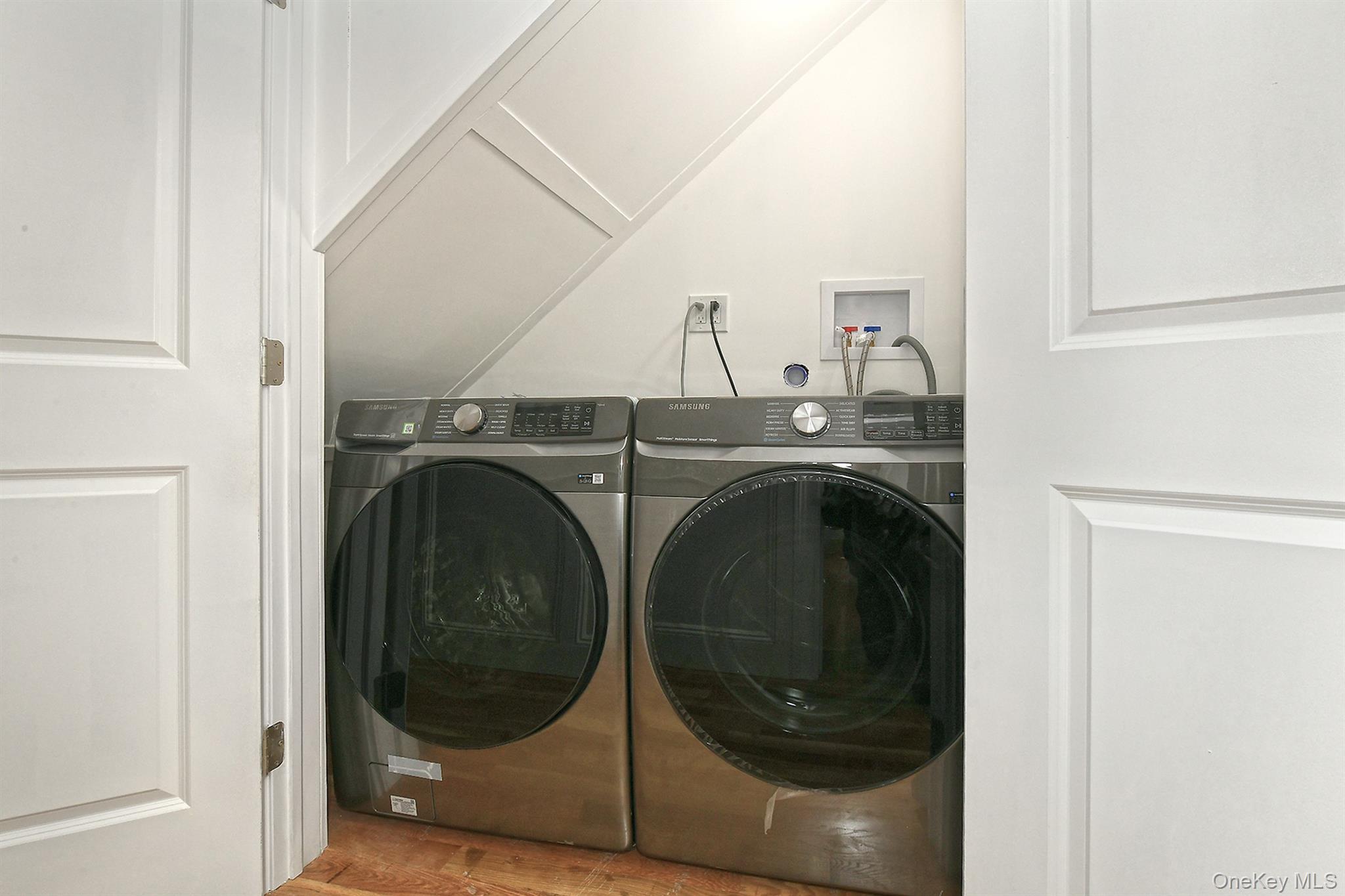 1903 George Court Merrick, NY 11566 - Photo 34 of 39 a utility room with dryer and washer