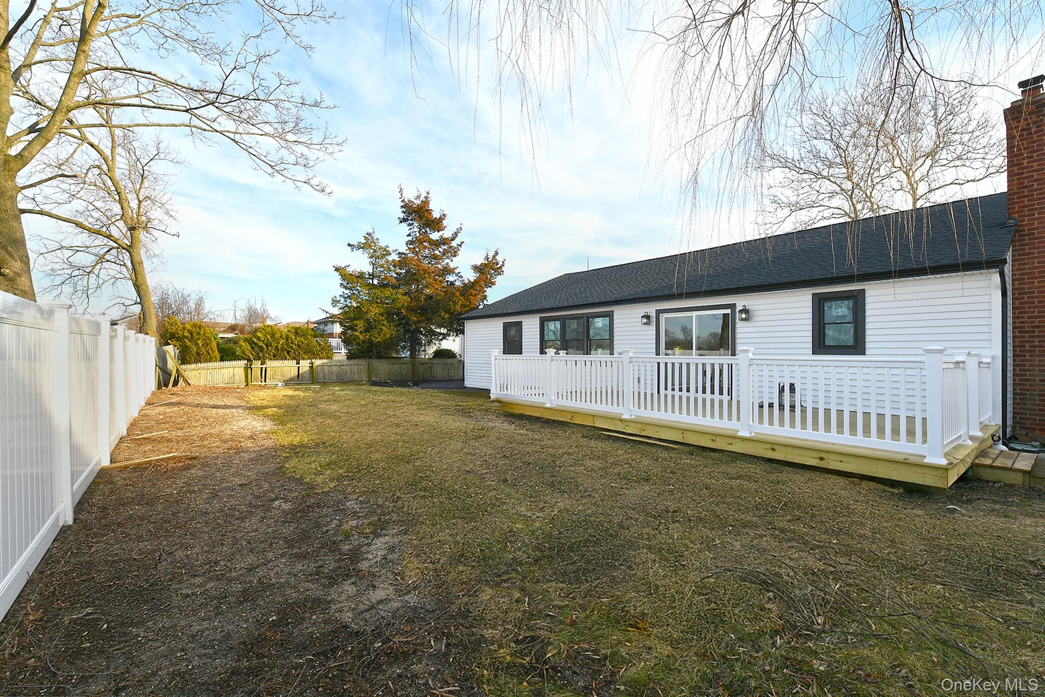 1903 George Court Merrick, NY 11566 - Photo 36 of 39 a view of a house with a yard