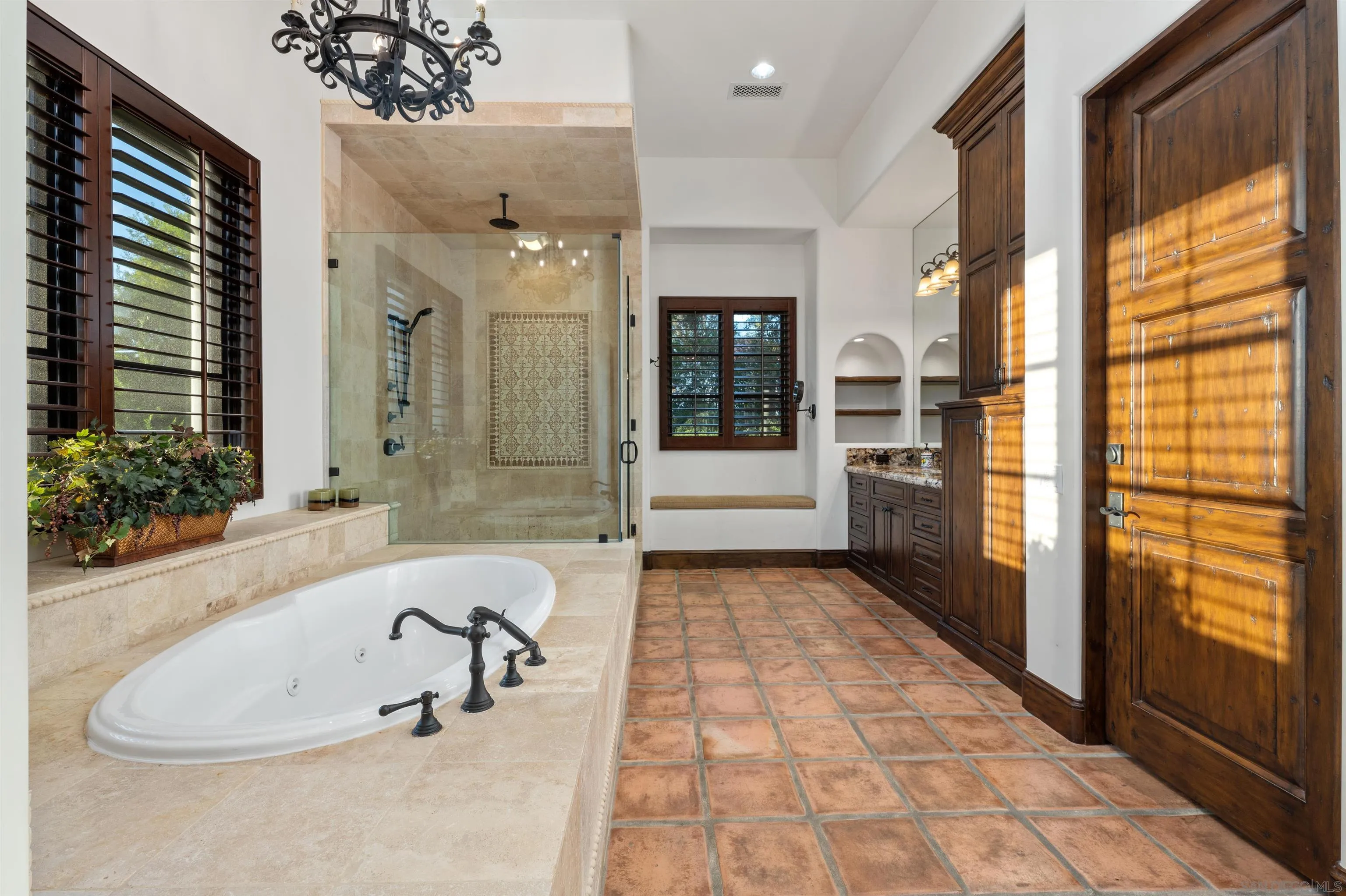 6870 La Valle Plateada Rancho Santa Fe, CA 92067 - Photo 19 of 37 a bathroom with a bathtub and a shower