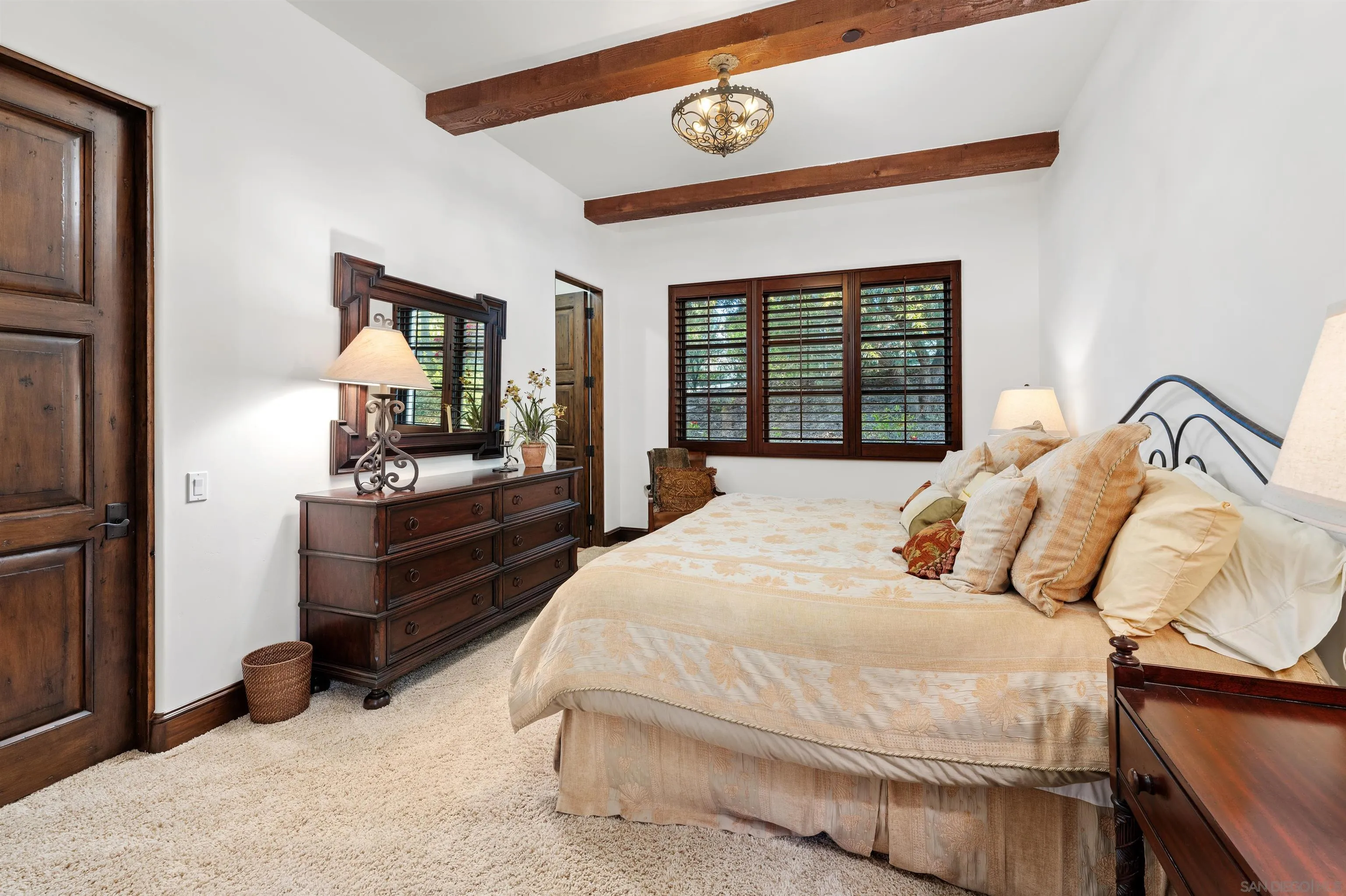 6870 La Valle Plateada Rancho Santa Fe, CA 92067 - Photo 20 of 37 a bedroom with a bed window and a dresser