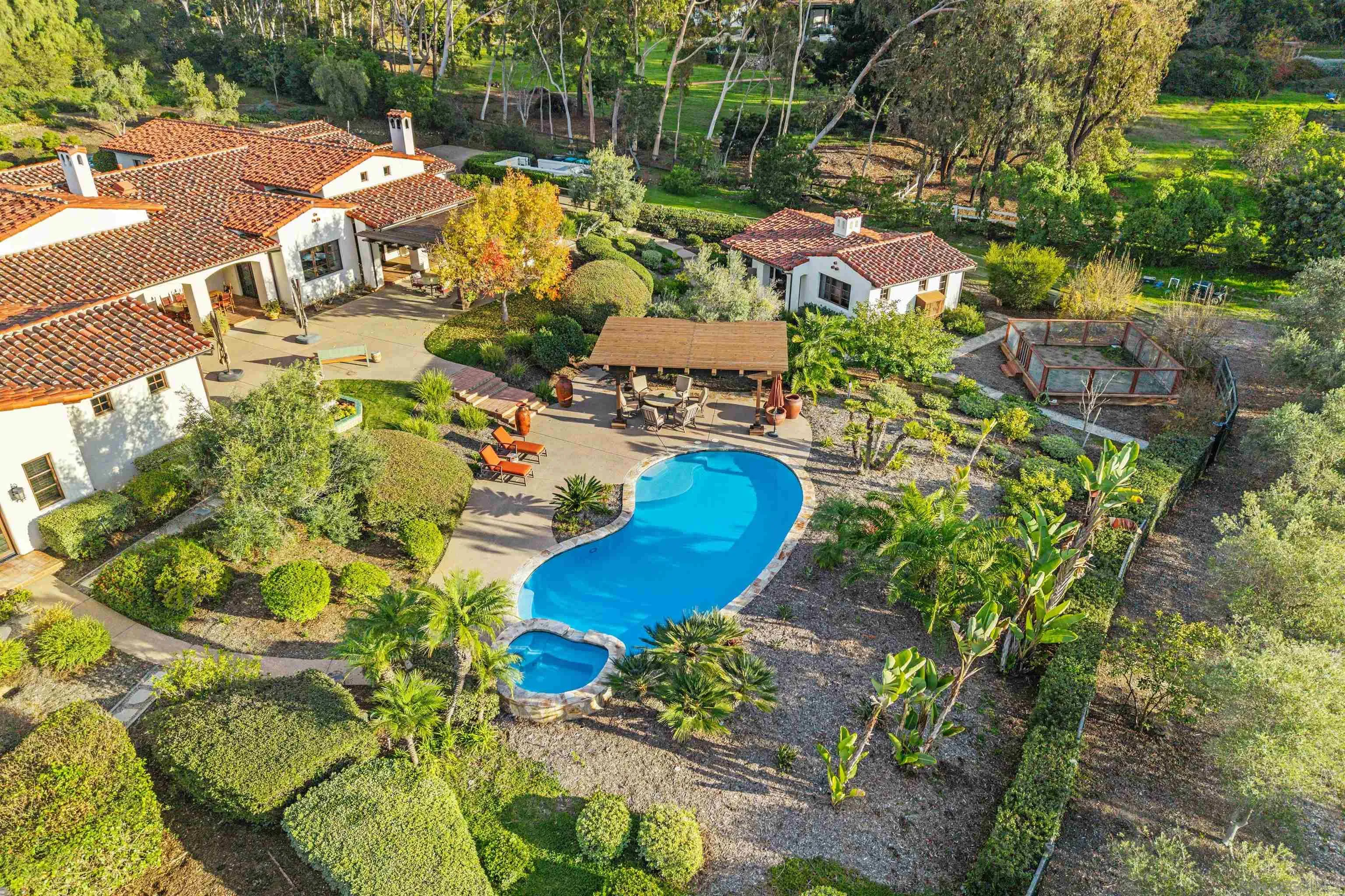6870 La Valle Plateada Rancho Santa Fe, CA 92067 - Photo 3 of 37 an aerial view of a house with a swimming pool