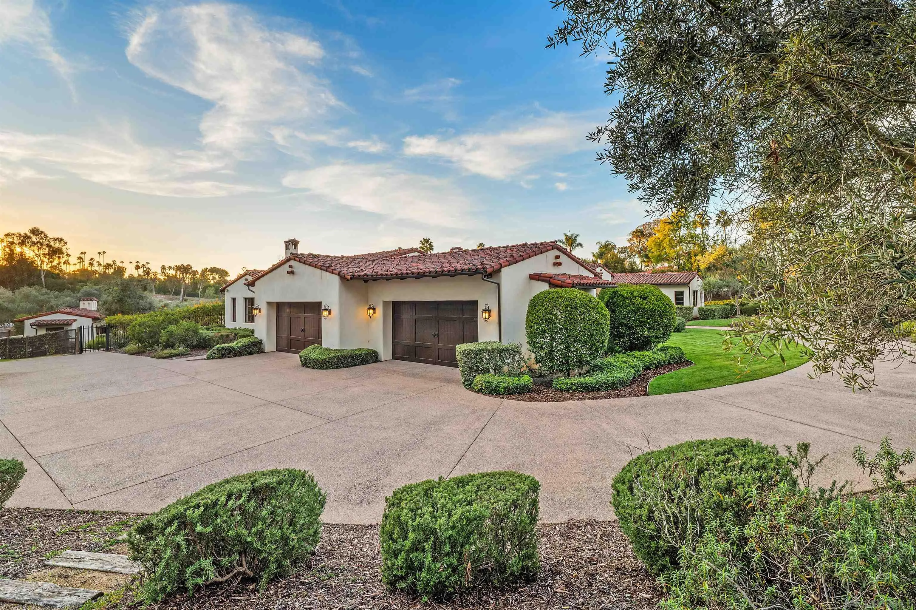 6870 La Valle Plateada Rancho Santa Fe, CA 92067 - Photo 31 of 37 a front view of a house with garden