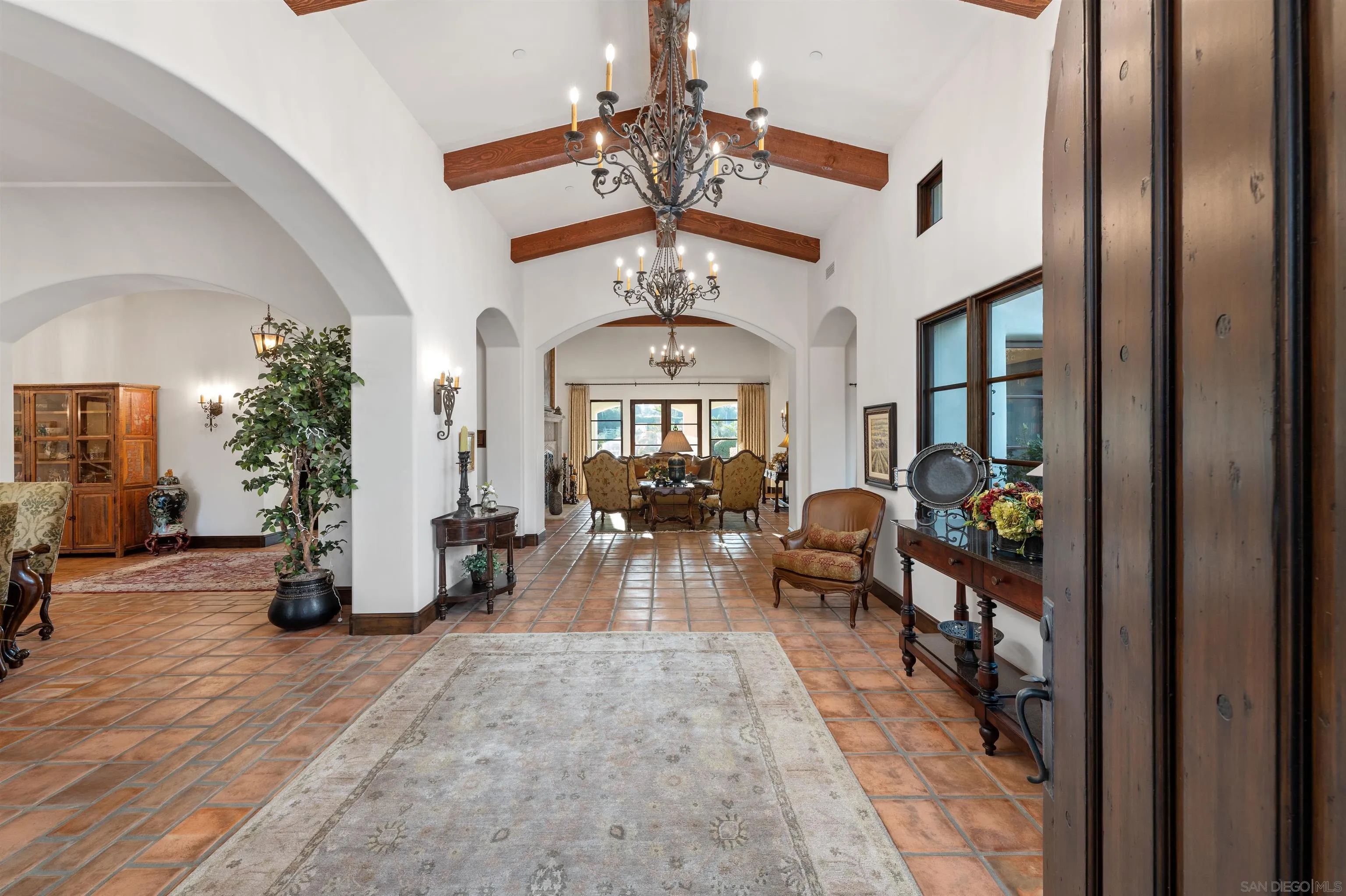 6870 La Valle Plateada Rancho Santa Fe, CA 92067 - Photo 7 of 37 a view of a room with gym equipment