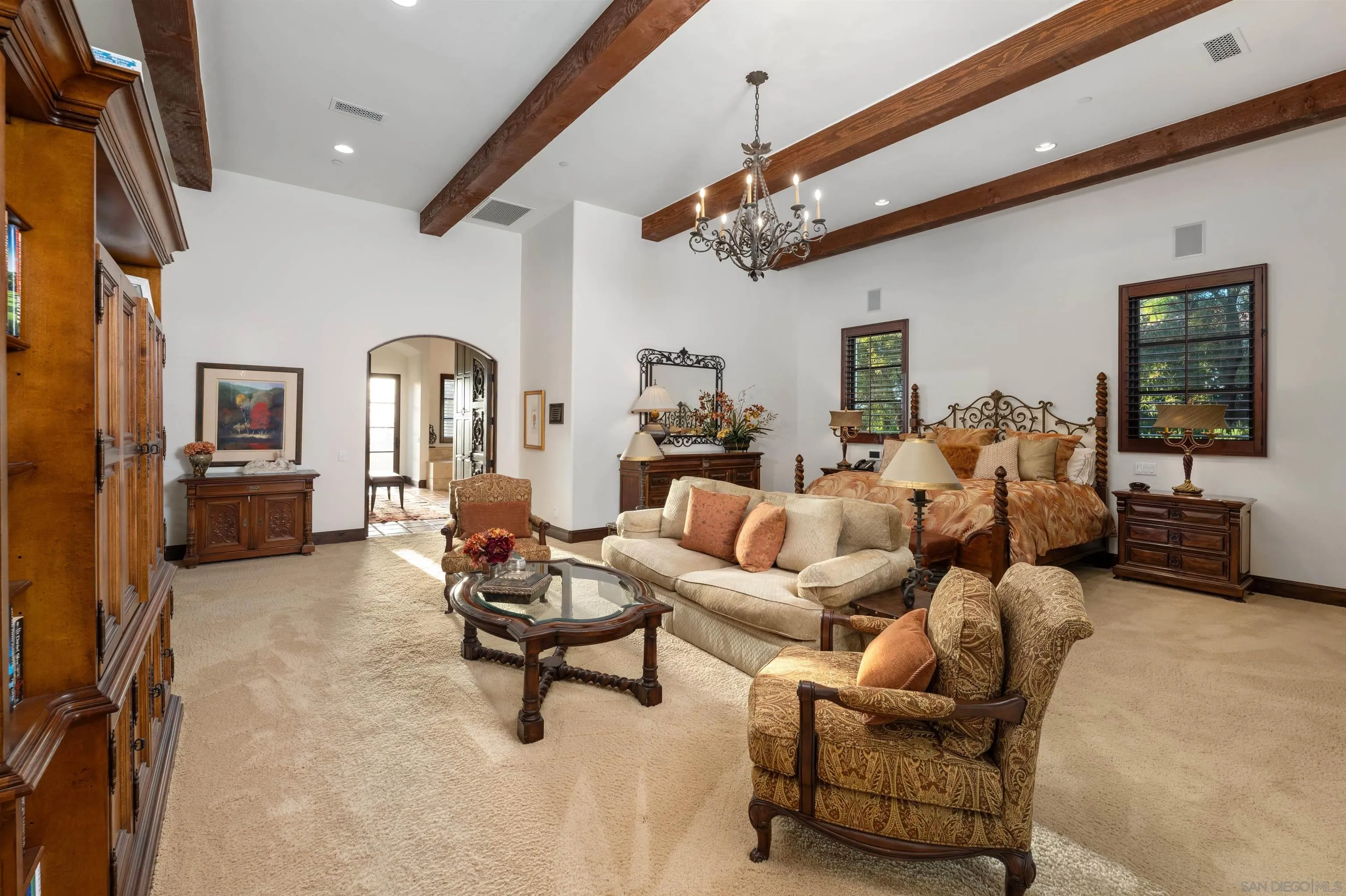 6870 La Valle Plateada Rancho Santa Fe, CA 92067 - Photo 10 of 37 a living room with furniture