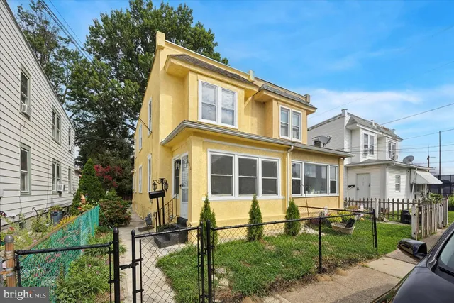 front view of house with a yard