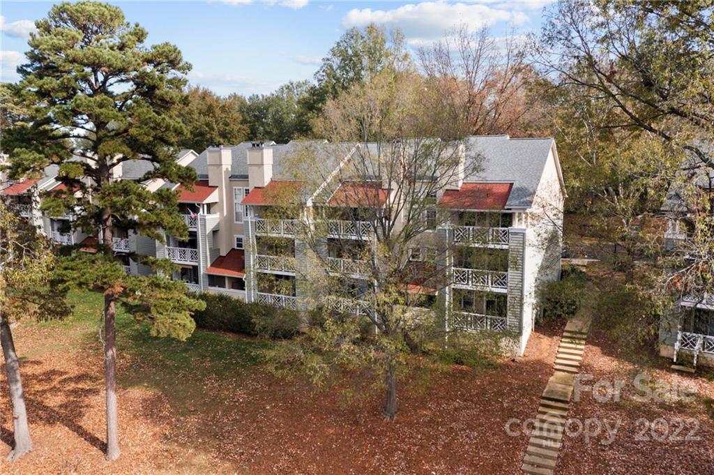 20105 Henderson Road, Unit E Cornelius, NC 28031 - Photo 2 of 23 a aerial view of multiple house