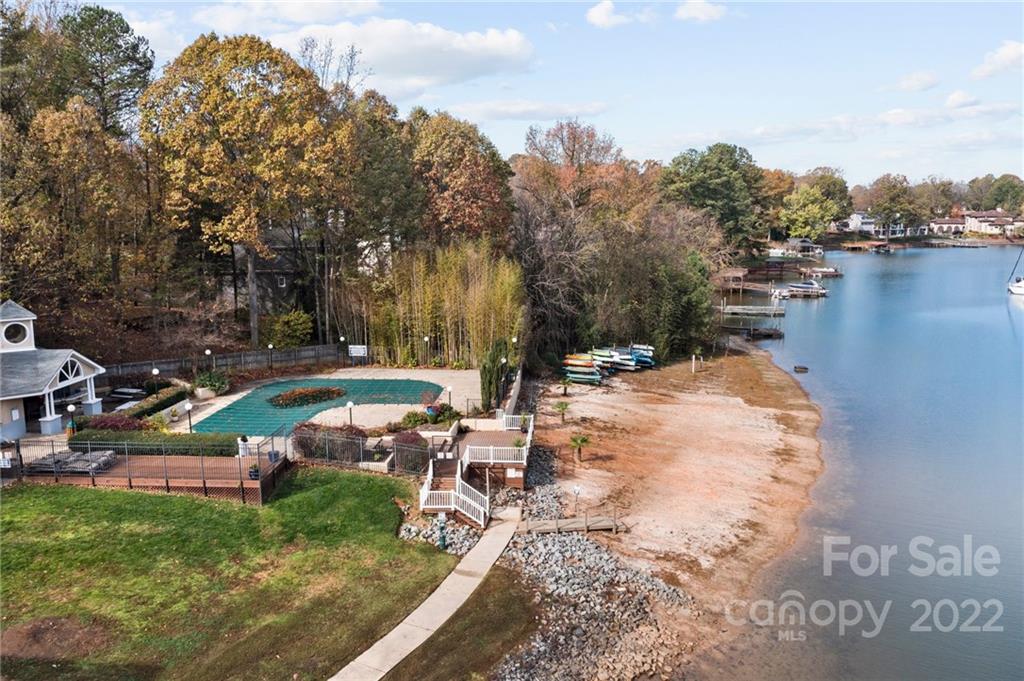 20105 Henderson Road, Unit E Cornelius, NC 28031 - Photo 4 of 23 a view of a lake with houses