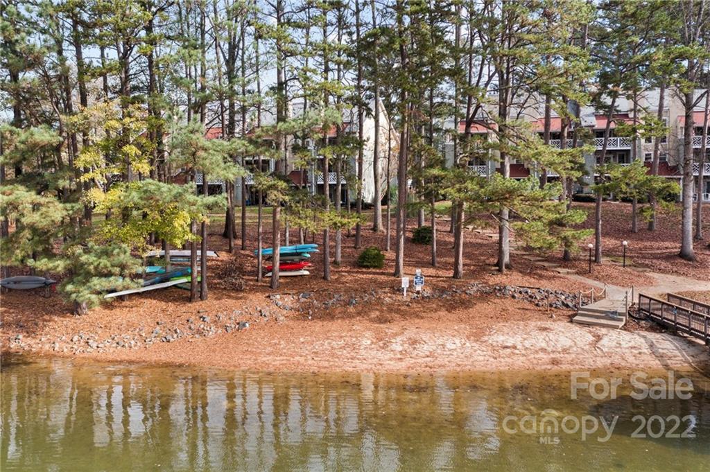 20105 Henderson Road, Unit E Cornelius, NC 28031 - Photo 5 of 23 a view of a park with large trees