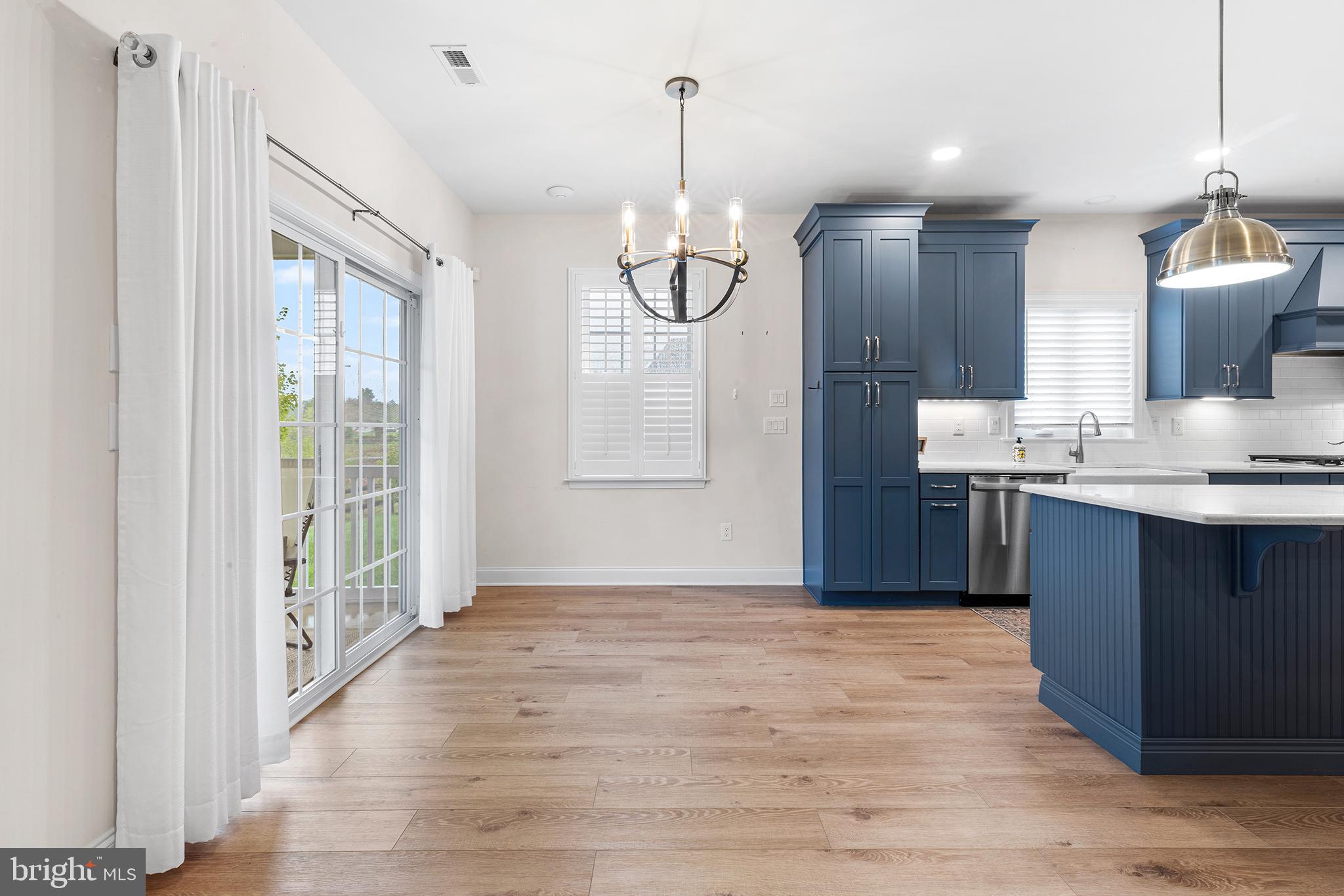 116 American Way Downingtown, PA 19335 - Photo 14 of 41 a view of kitchen with granite countertop cabinets and wooden floor