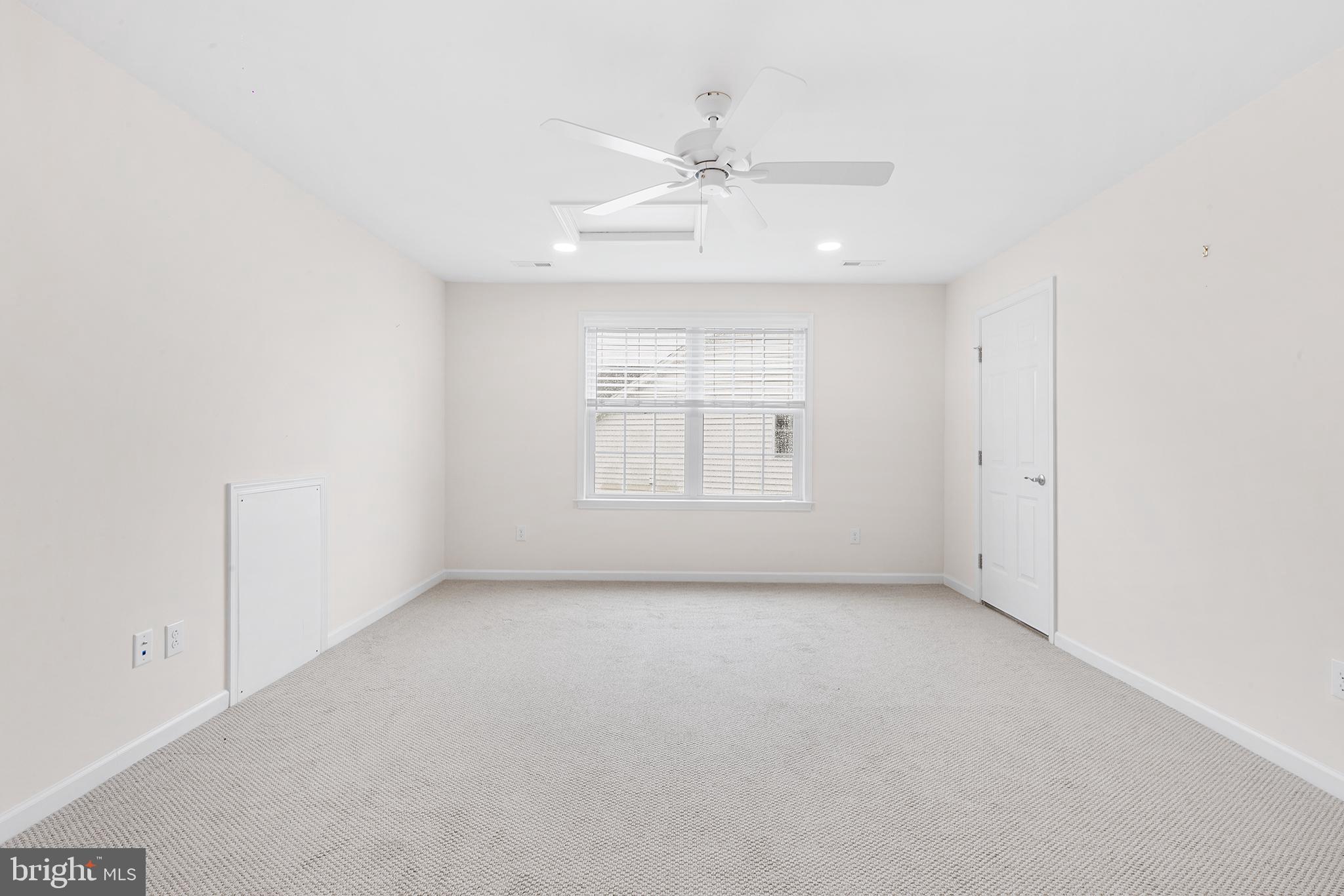 116 American Way Downingtown, PA 19335 - Photo 27 of 41 an empty room with a ceiling fan and window