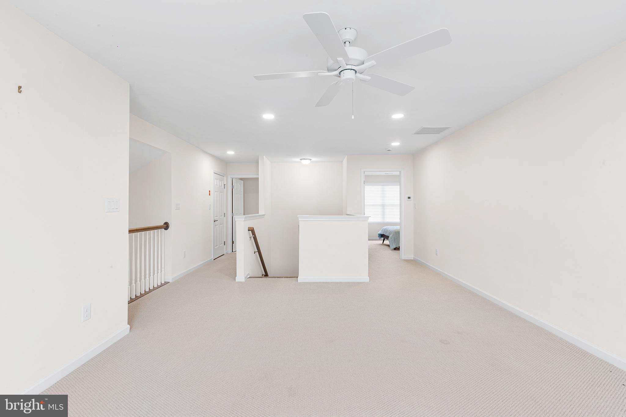 116 American Way Downingtown, PA 19335 - Photo 28 of 41 a view of a big room with white walls and kitchen