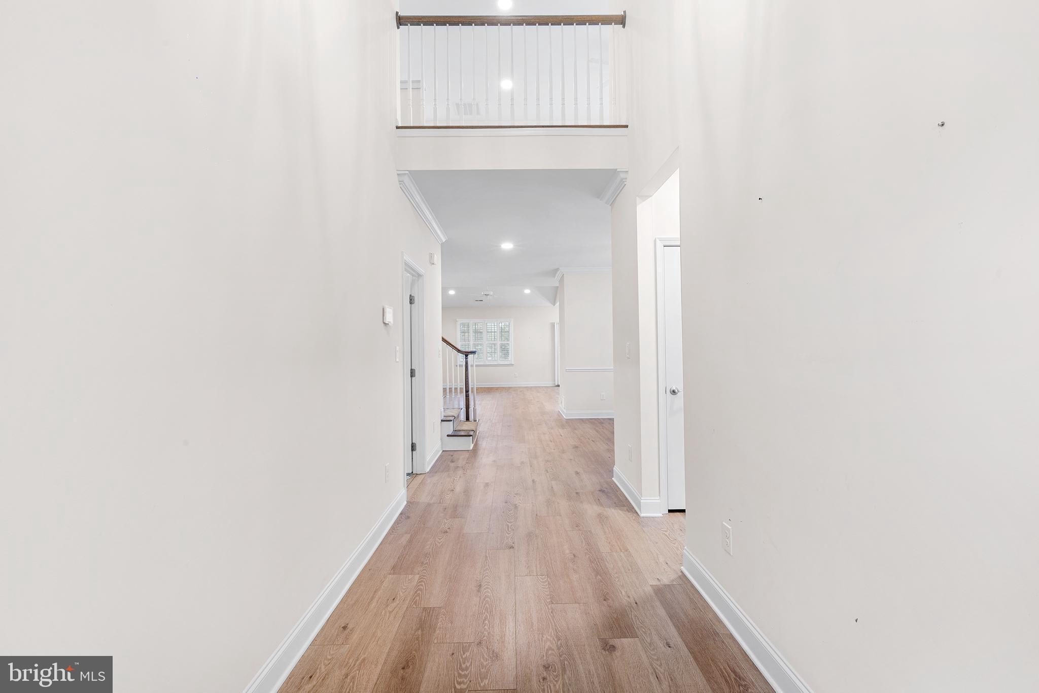 116 American Way Downingtown, PA 19335 - Photo 7 of 41 a view of a hallway with wooden floor