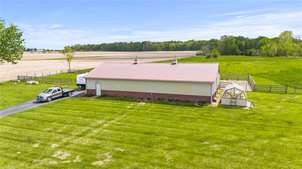 4222 Ramsey Road Springfield, OH 45502 - Photo 19 of 79 This expansive rural property features a large barn and an additional greenhouse, perfect for agricultural pursuits.