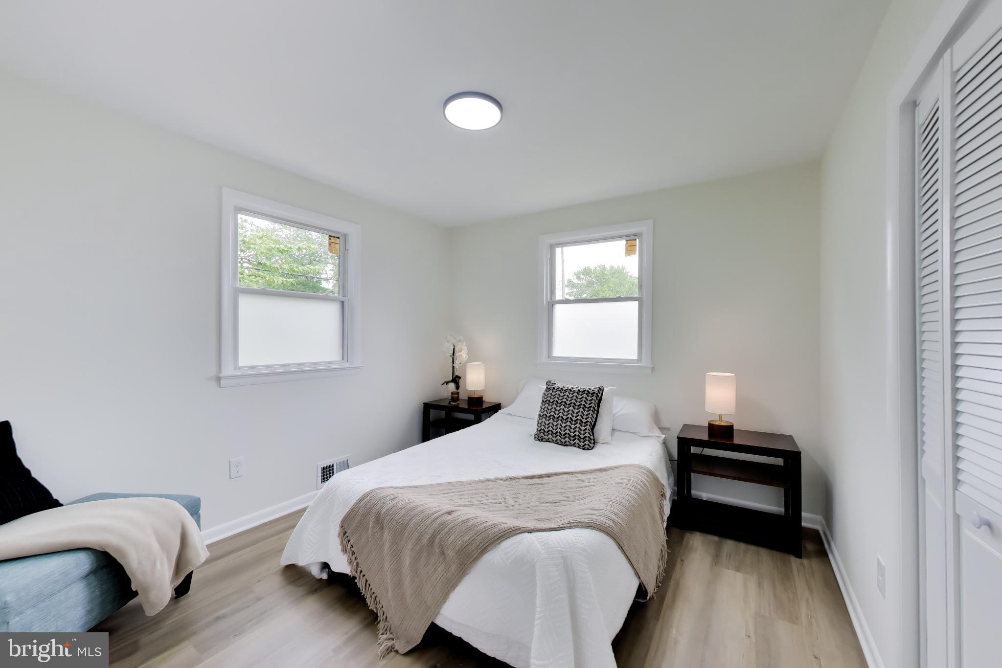 11309 Keystone Avenue Clinton, MD 20735 - Photo 15 of 36 a bedroom with a bed and a window