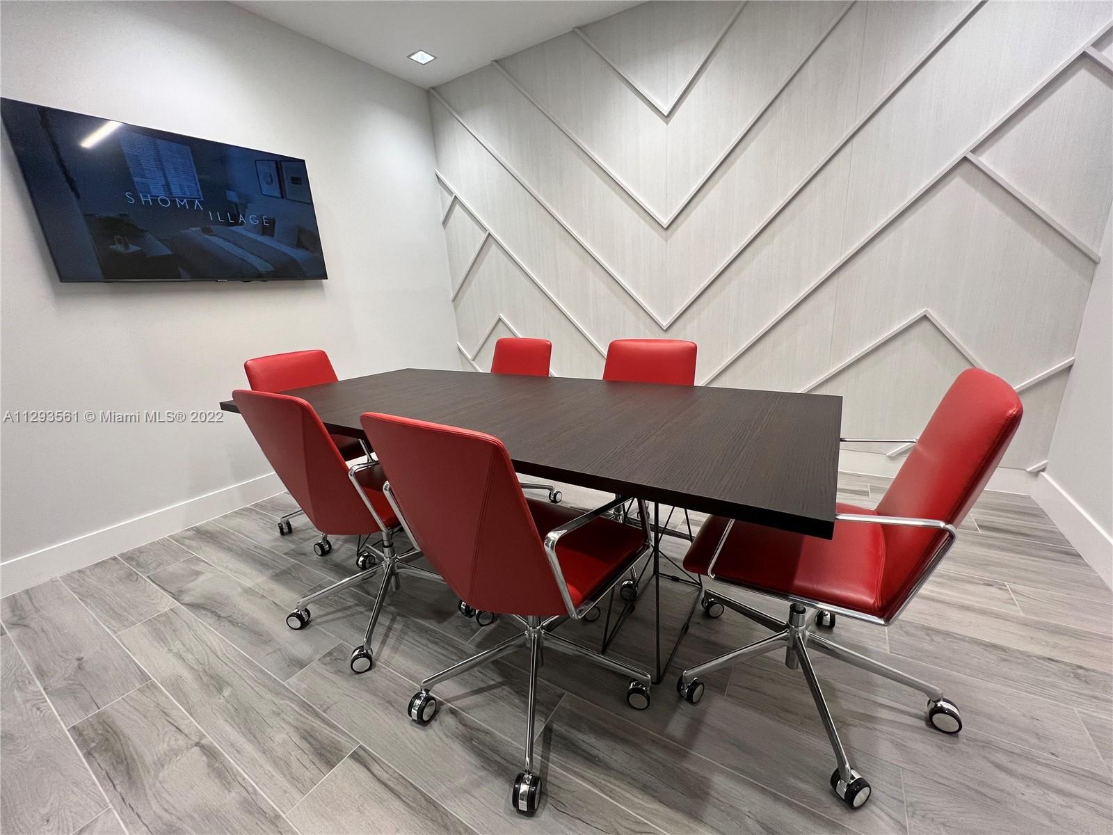401 Hialeah Drive, Unit 320 Hialeah, FL 33010 - Photo 23 of 27 a view of a dining room with furniture and wooden floor