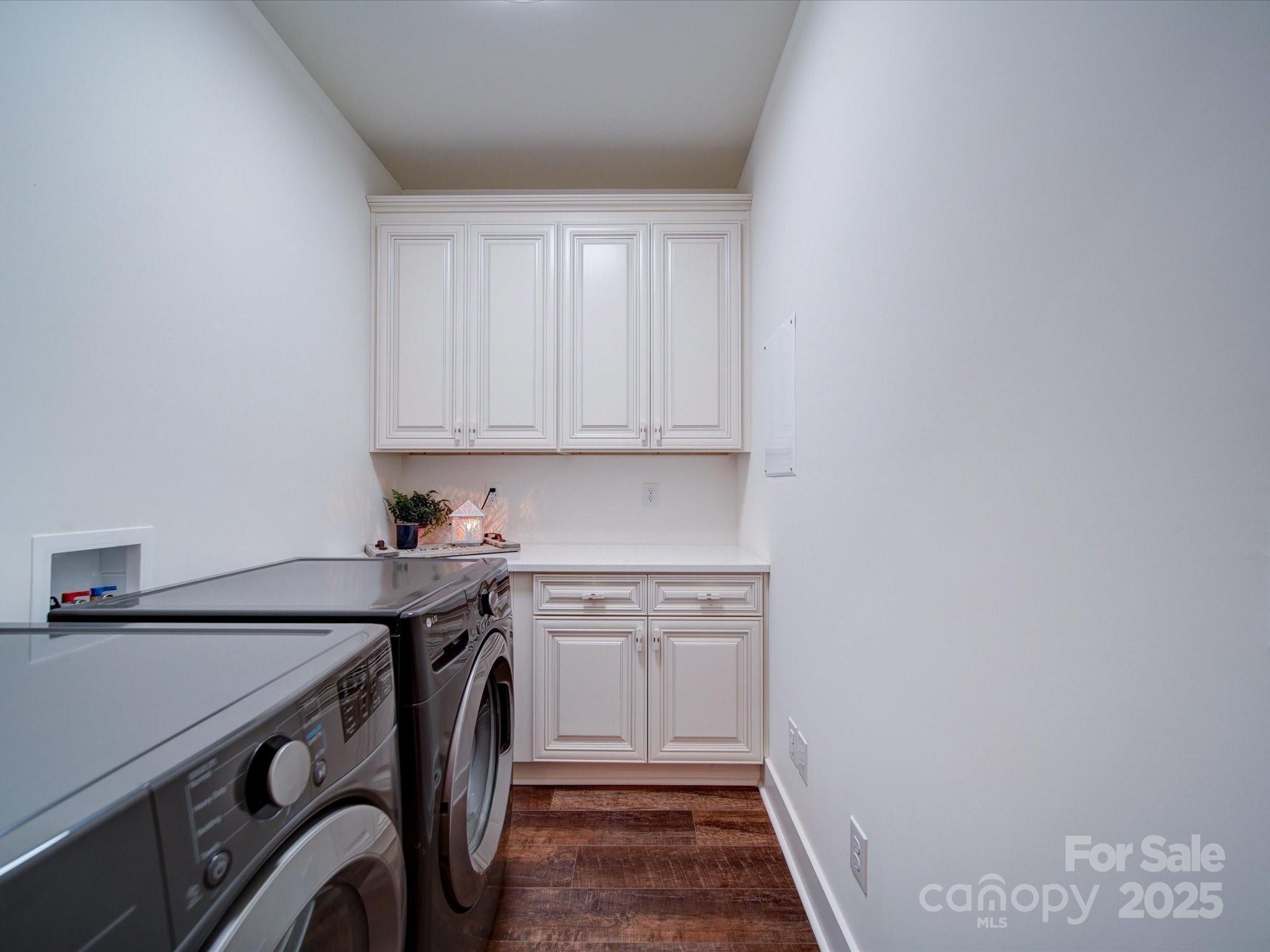 0 Trull Hinson Road, Unit 2 Wingate, NC 28174 - Photo 22 of 25 a utility room with a sink a washer and dryer