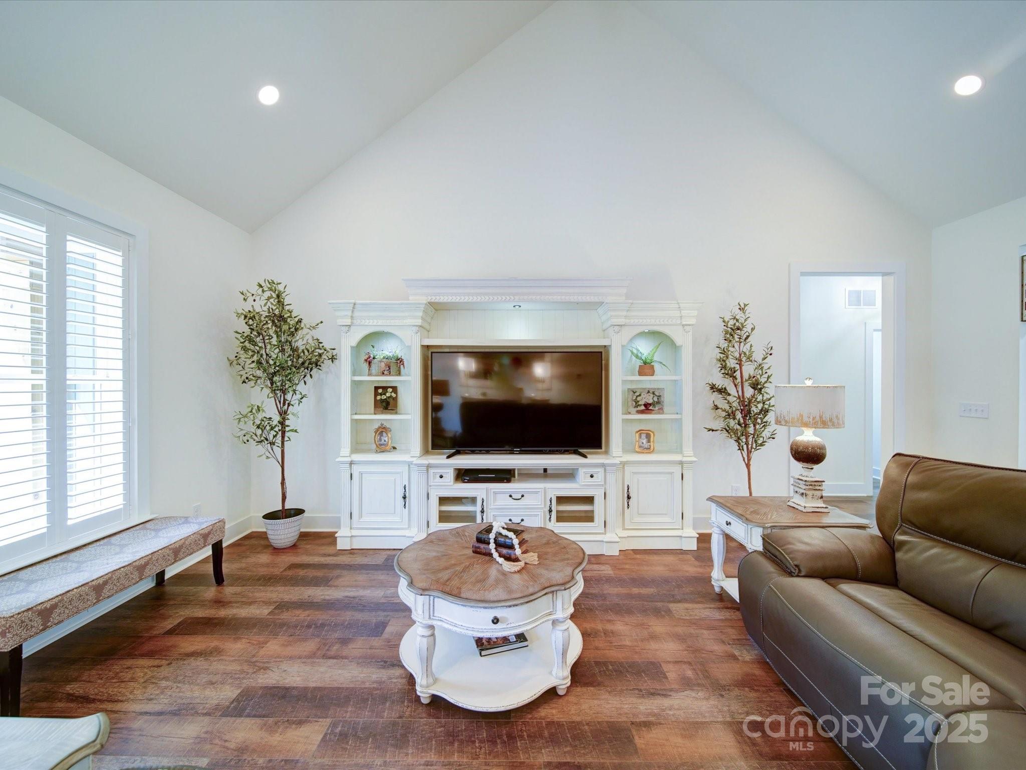 0 Trull Hinson Road, Unit 2 Wingate, NC 28174 - Photo 7 of 25 a living room with furniture and a flat screen tv