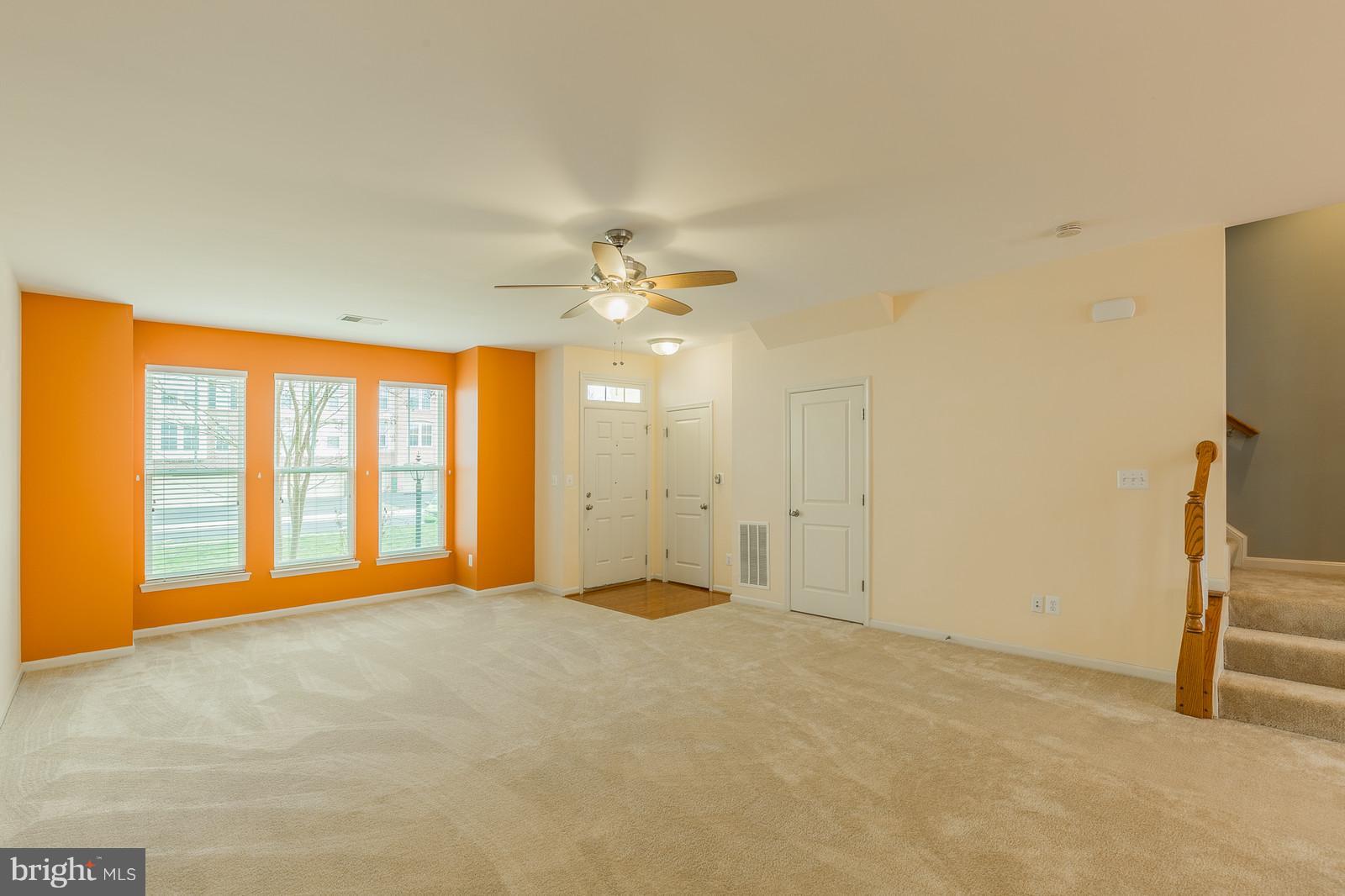 9104 Ribbon Falls Loop Bristow, VA 20136 - Photo 2 of 26 Family Room with New Carpet