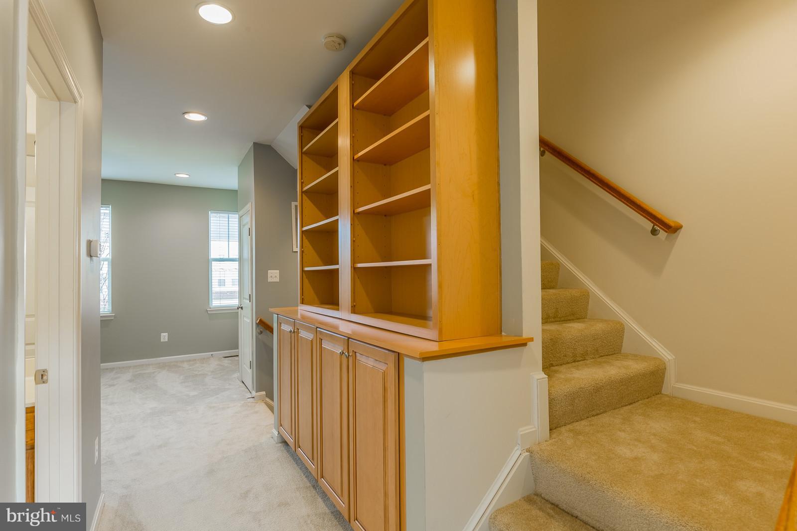 9104 Ribbon Falls Loop Bristow, VA 20136 - Photo 11 of 26 Custom Built in Bookcase