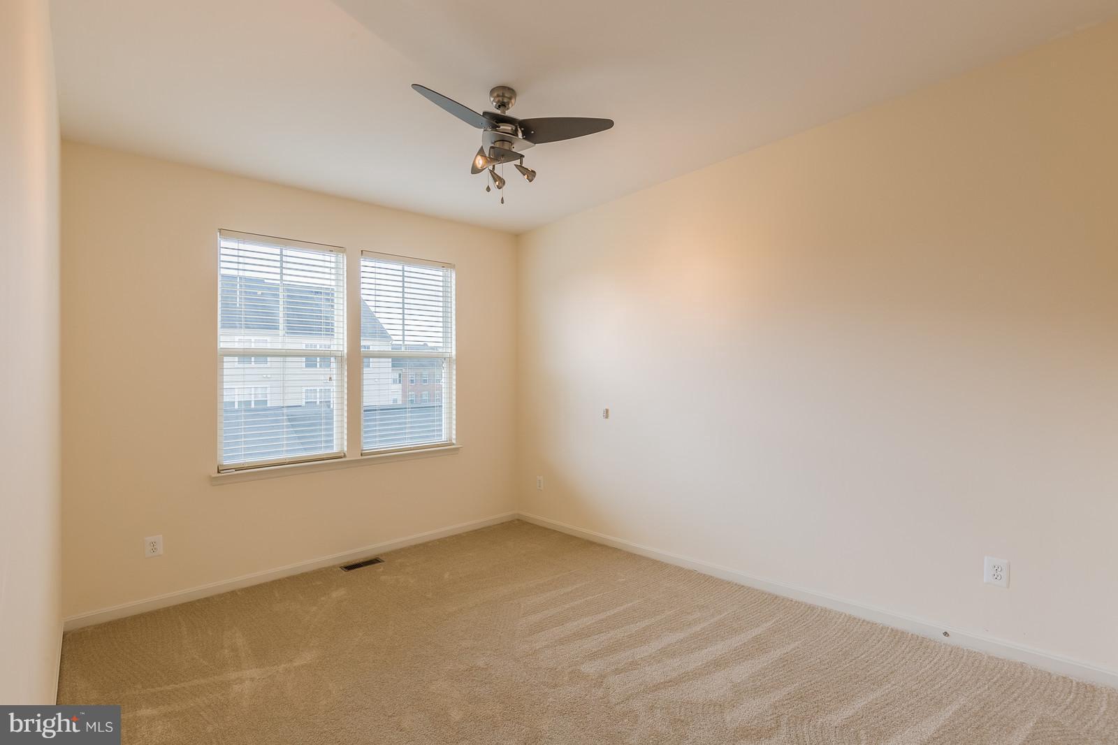 9104 Ribbon Falls Loop Bristow, VA 20136 - Photo 16 of 26 Second Bedroom with Ceiling Fan
