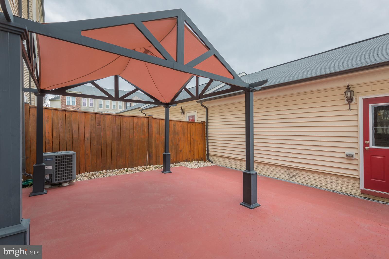 9104 Ribbon Falls Loop Bristow, VA 20136 - Photo 21 of 26 Covered Gazebo in Fenced In Area