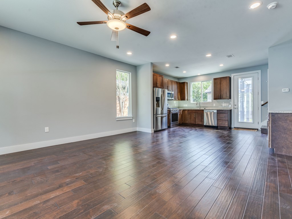 406 Post Rd Drive, Unit 1 Austin, TX 78704 - Photo 2 of 30 living area with wooden floors and ceiling fan