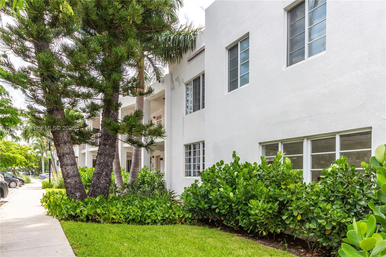 1241 14th Street, Unit 9 Miami Beach, FL 33139 - Photo 4 of 19 a view of a building with a garden